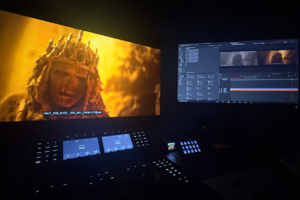 Film clapperboard on a green screen placeholder